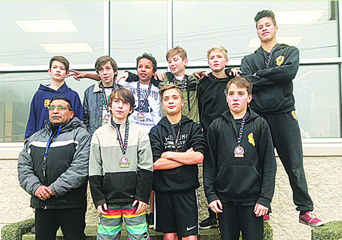 Young island wrestlers nab medals