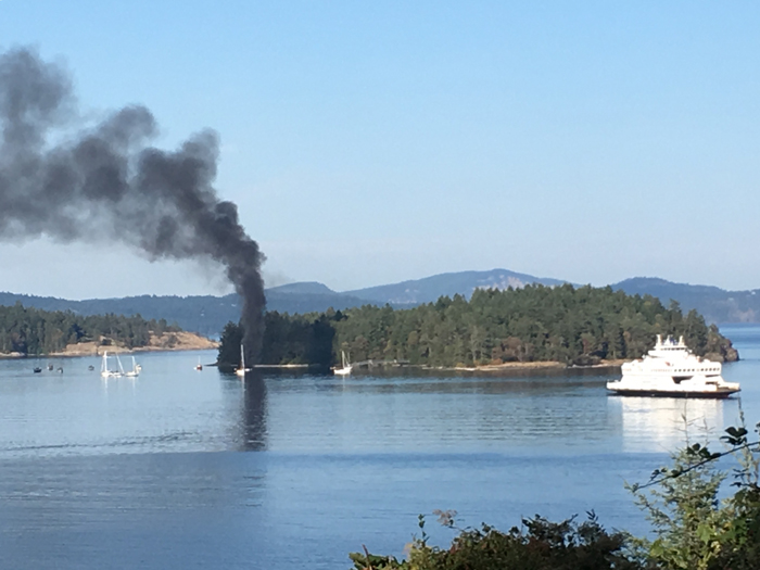 Sailboat burns off Russell Island