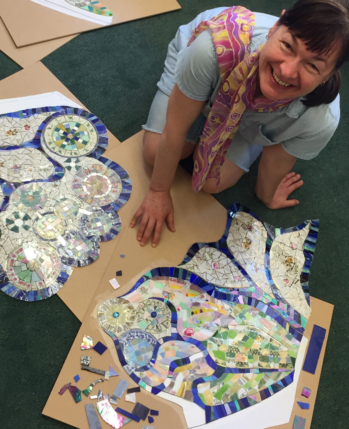 Allegories rise from butterfly mosaic at school