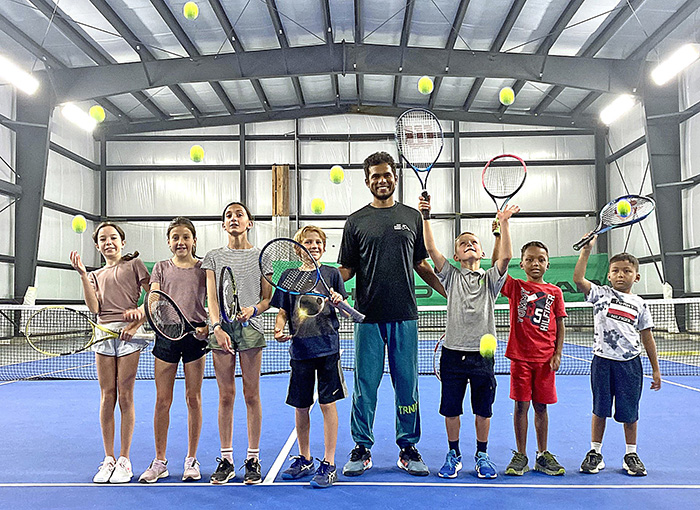 High-level tennis coach welcomed to island