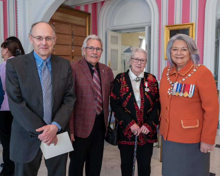 Benson collects Order of Canada medal